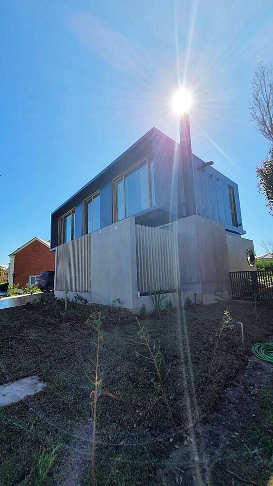 Casa steel frame terminada, revestimiento y carpintería